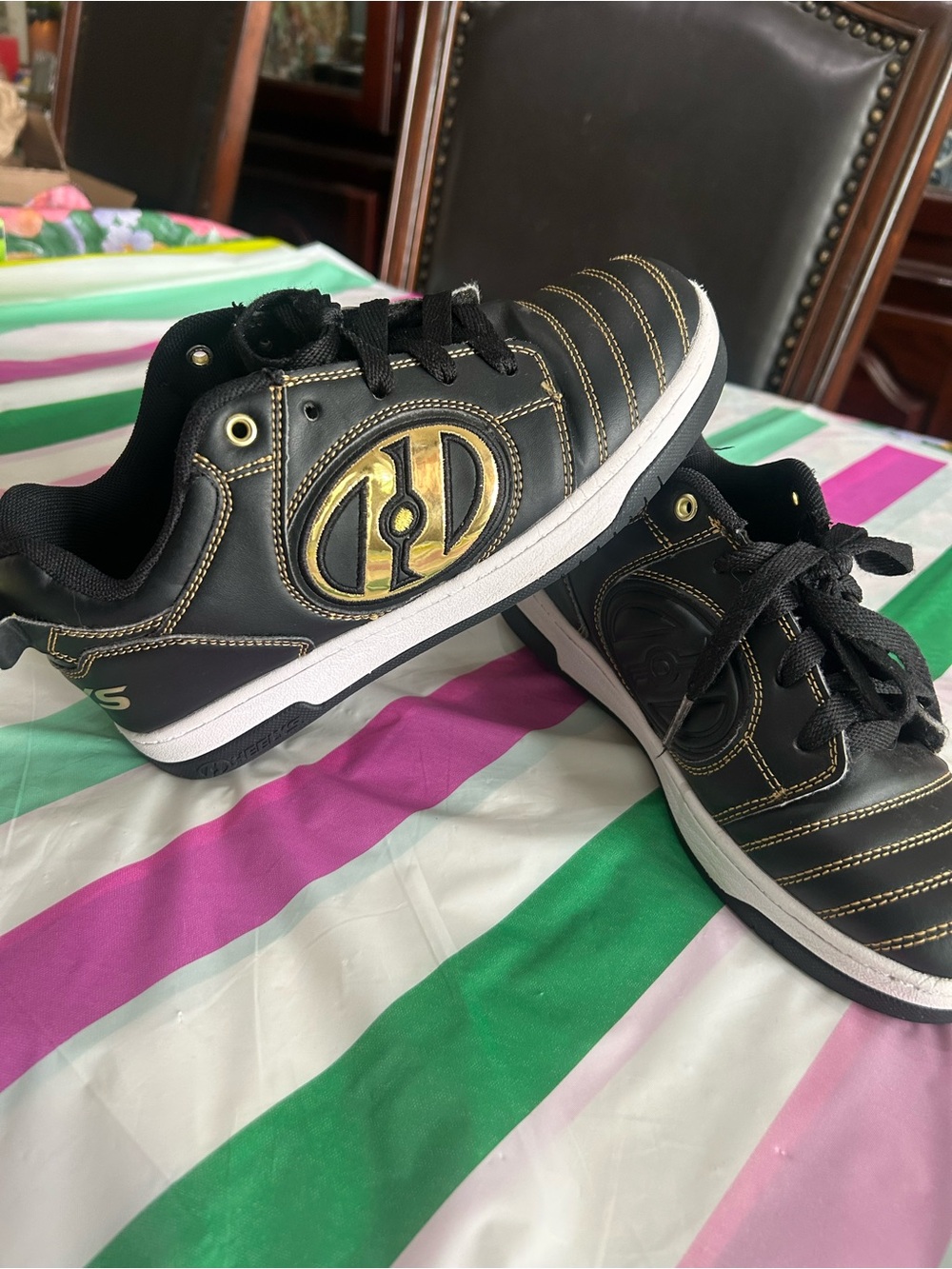 Heelys Black rolled skate Sneakers with Gold Logo Accent size 6.  Welled.